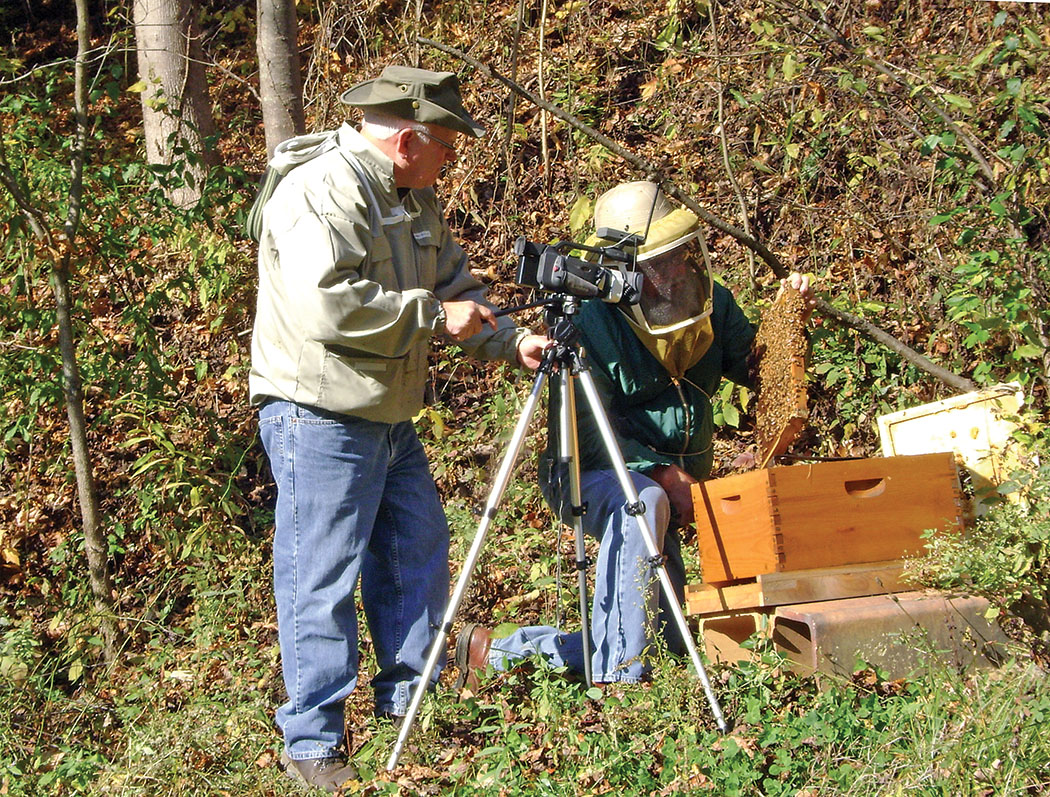 Two beekeepers and a camera.