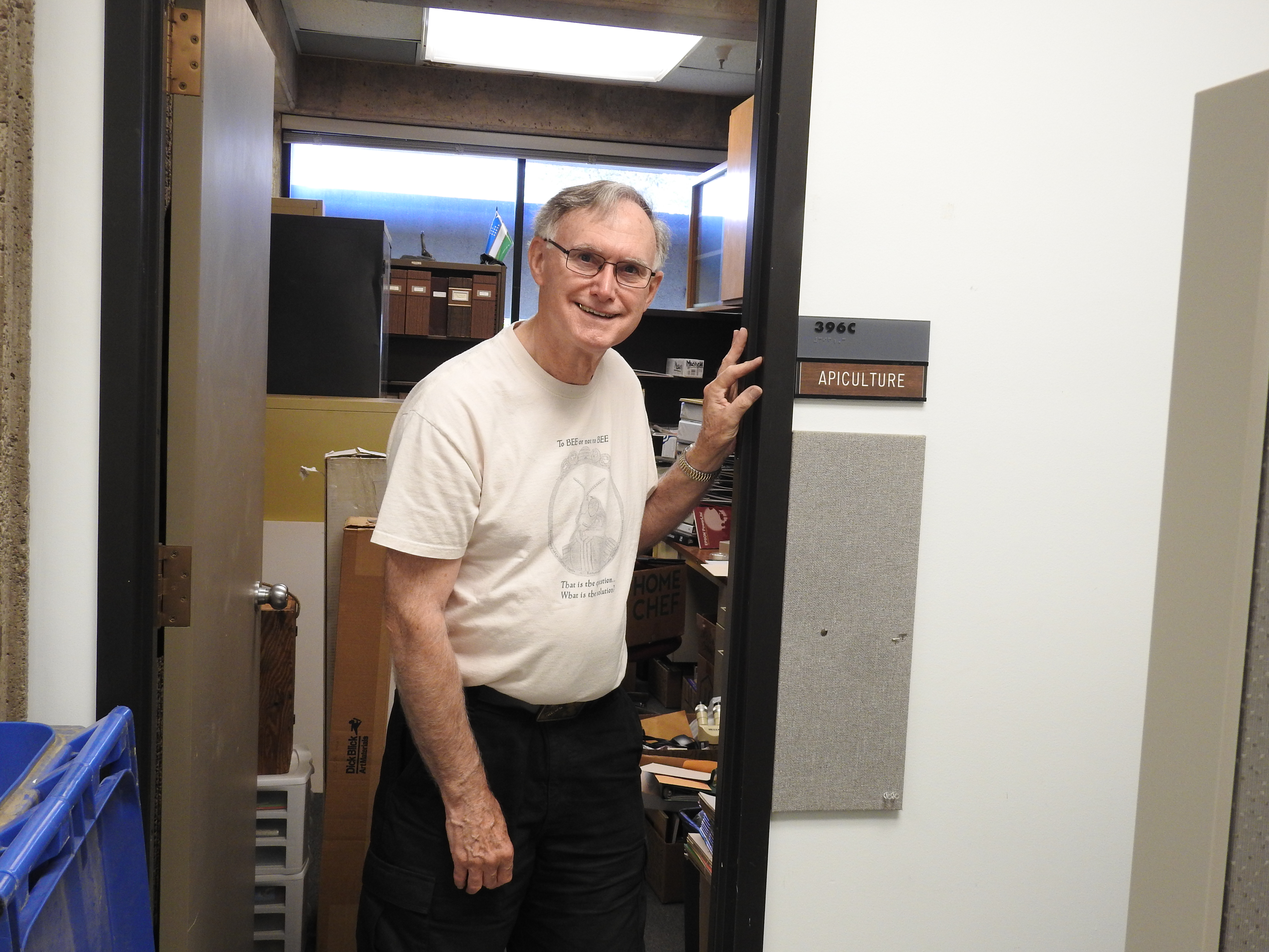 Eric Mussen, a 38-year UC Cooperative Extension apiculturist and member of the UC Davis Department of Entomology and Nematology office, leaves his office for the last time. He retired in 2014 and cleaned out his office in 2021. (Photo by Kathy Keatley Garvey)